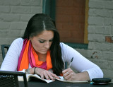Studying At An Outdoor Cafe