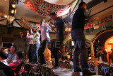 Dancing on table-top; At 'A Fun Ti' in Beijing