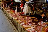 Outdoor meat market. Jishou City, Hunan Province, China