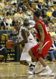 Georgia Tech G Clinch looks for an opening to get around Maryland G Tucker