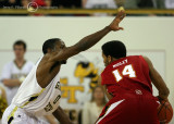 Georgia Tech G Clinch gets ready for a move by Maryland G Mosley
