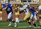 Tech DB Jerrard Tarrant returns the first of his two interceptions on the day