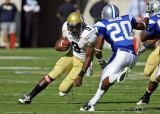 Georgia Tech QB Nesbitt cuts up field and is met by MTS S Kellem