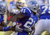 Blue Raiders RB Phillip Tanner fakes receiving the handoff from QB Dasher