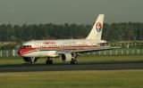 MU 319 landing, with thrust reverser open, July, 2004, PEK
