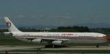 MU 340-300 at PEK, July 2004