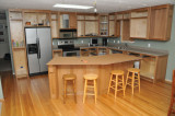 Cabinets and some countertops are installed.