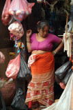 Female Shopkeeper in Doorway
