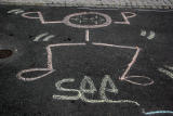 See Sidewalk Graffiti