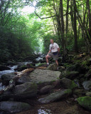 Rick on the rocks in the creek.jpg