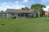 THIS HOUSE WAS REASONABLY INTACT, BUT HAD A LOT OF DOWNED TREES IN THE FRONT YARD