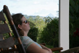 Angela relaxing on Chalet Nicholas front porch