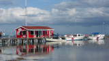 There were some motor boats tied along the dock.