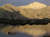 Feather Peak reflected on a tarn in Bear Basin