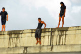 Local boys getting ready to dive off the bridge