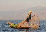 Inle Lake fisherman leg-rowing