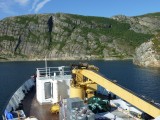 Navigating a narrow passage between some islands