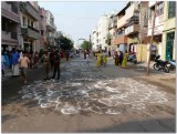 thiruvallkEni thiruveedhi getting ready to receive pArthasarathi in thiruthEr.jpg