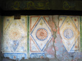 Weathered murals at the Baba Arabati tekke
