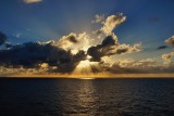 Sunset rays and clouds