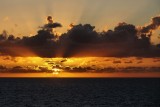 Sunset rays radiating