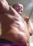 dad flexing hairymuscles.jpg