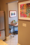 Kitchen looking into small patio room