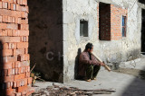Man smoking, AiChun village