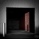 The red brick wall.