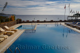 Resort hotel pool over the Aegean Sea at Assos Iskele Behram Turkey