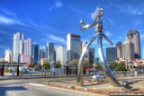Walking Tall sculpture and Dallas Skyline