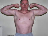 irish muscle dad flexing arms.jpg
