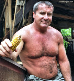 carolina jim rancher holding cob corn.jpg