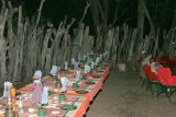 Preparing for dinner in a traditional African boma