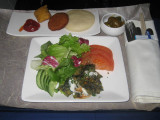 ANA flight: Appetisers - Spinach fritters and fresh garden salad with yoghurt-tamarind sauce. Potato and Indian cheese croquette