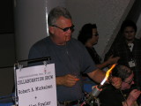 Mickelsen at work, working on tubing.