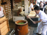 Downtown Osaka, watching live thumping of the mochi. It was fun to watch them fly with those hammers, and more fun to eat!
