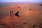 (AR18) Aerial view of West Mitten, East Mitten, and Merrick buttes, Monument Valley, AZ