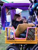 Small girl, part of a couple of families who brought pimped out wagons to the show
