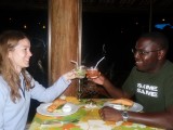 On their honeymoon, London couple Larraine and Tunu make a toast.