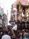 19-Parthasarathy Utsavam.Day 07.Ther.Sri Vaishnavas giving thrust from back of the ther.JPG