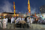 Preparing for the fire-walk.