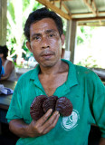 Wielson Mauricio holding some small Reishi mushrooms. Feb. 23, 2011 IMG_1366.jpg