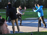 Crazy Tourists Holding Up Tower