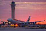 2010 - Iberia Airbus A340-313 taking off at sunset at Miami International Airport aviation sunset stock photo