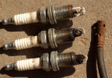 The Coil Wire Had Infinite Ohms...All Four Plugs Were SHOT...I Lost One Before I Took The Photo.