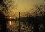 Sunrise Through the Fence