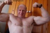 muscle bear daddy posing.jpg