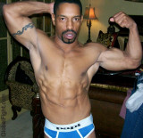 biceps flexed hot man.jpg