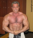 musclebear posing shirtless man.jpeg